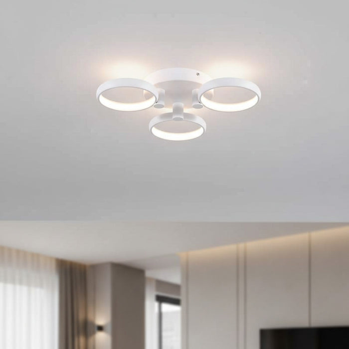 white LED flush ceiling light mounted in a hotel room