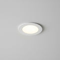 white ultra slim downlight installed on a grey ceiling