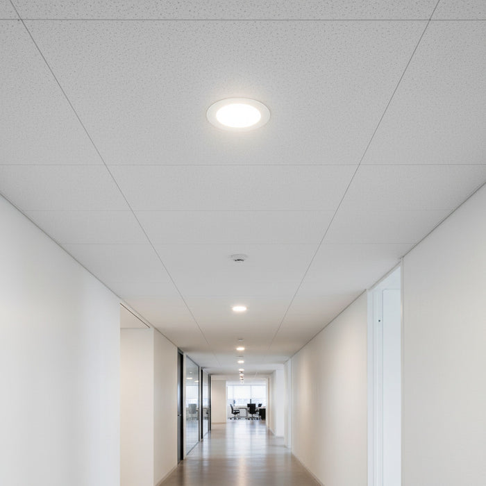 white ultra slim downlight installed in an office corridor