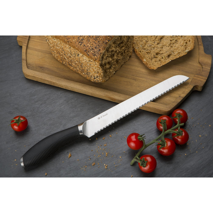 Image shows Circulon bread knife on chopping board with loaf of bread.