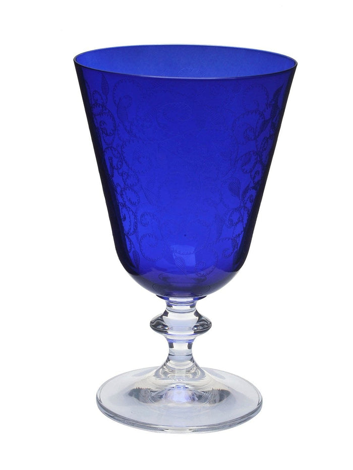 Close-up of the detailed engraving on a Bella dark blue glass.