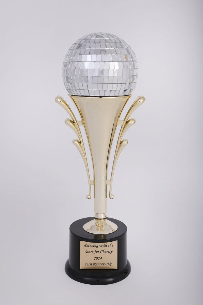A trophy featuring a black round base with a gold-colored riser, holding a 4 inch mirror disco ball, and includes a plate with engraving.