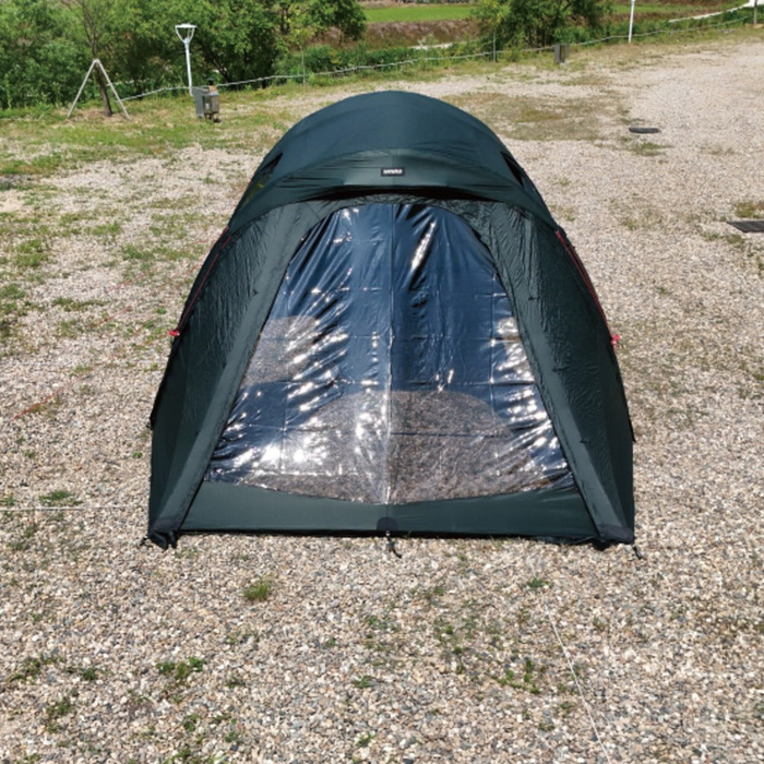Front view of a dark green Gopamir TN600 shelter with the clear TPU window panel zipped into the door