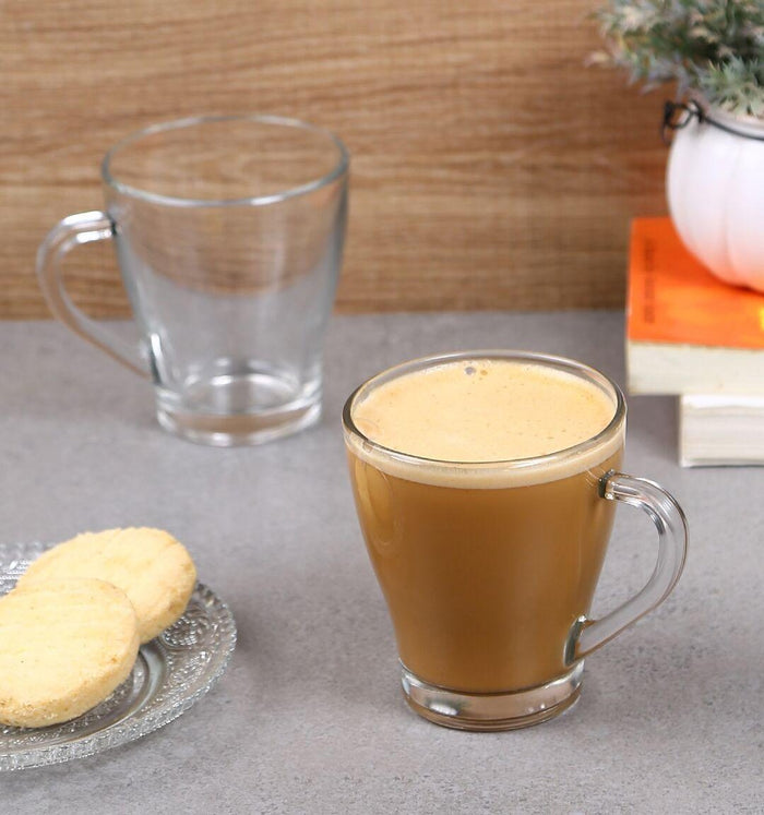 Close-up of steaming coffee in a clear Glass Mug.