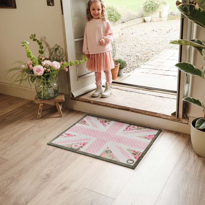Country Rose Flag Doormat- 100% recycled cotton doormat featuring a pink union jack flag surround by florals.