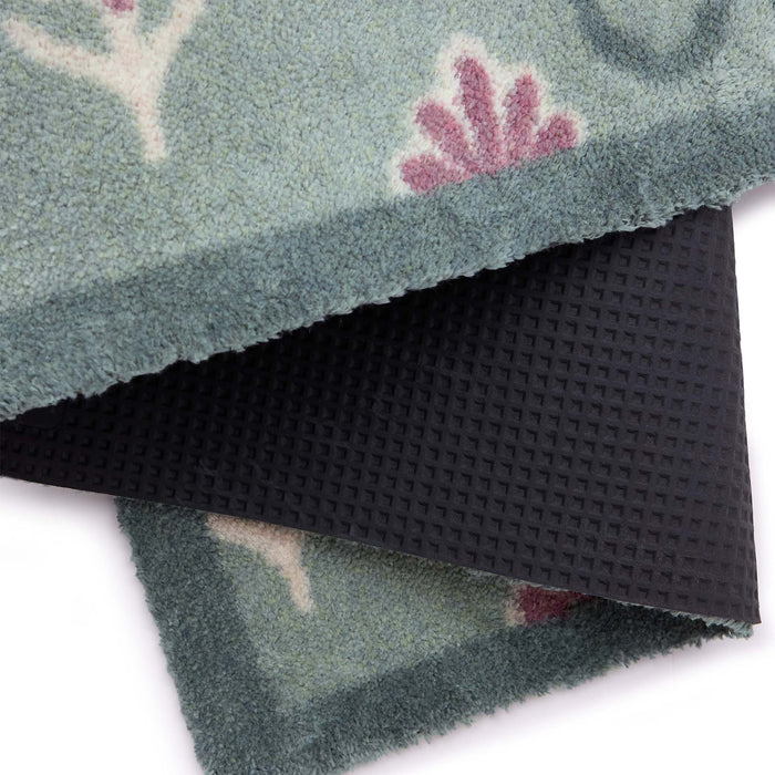Disty Floral Green- Made from 100% recycled cotton featuring a woodblock pattern of purple flowers.