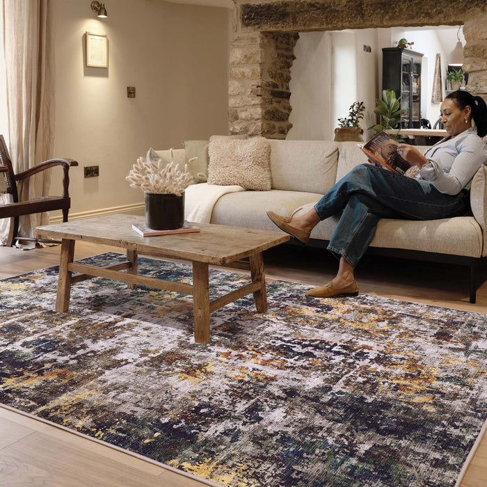 Raft Texture Natural Rug - 100% recycled content rug featuring a textured design in multi.