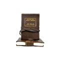 Leather journal with The New York Public Library gold stamp, tied with string.