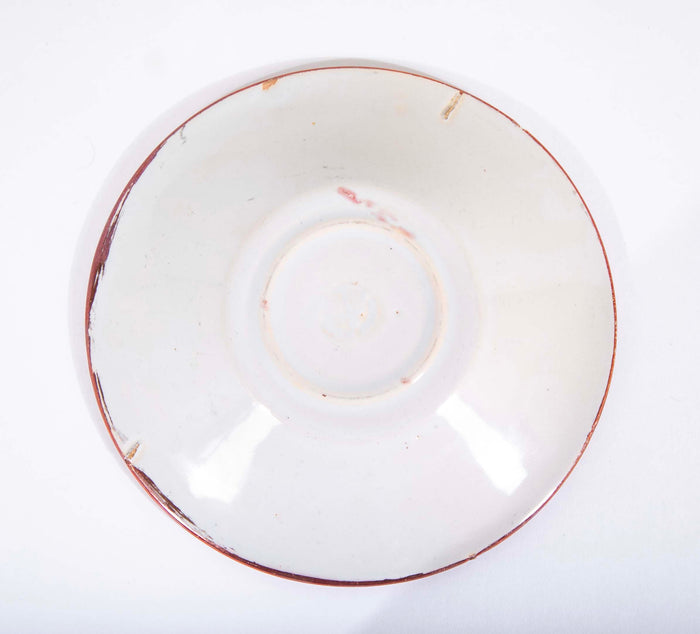 Ruby Lustre Ware Plate with Man Carrying Bird on a Stick