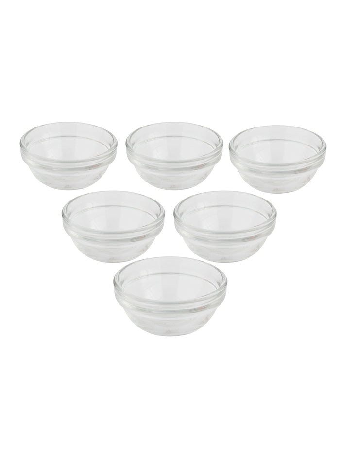 Clear glass bowls stacked and ready for serving chutneys.