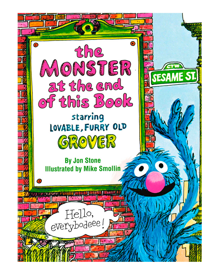 Children's book cover for 'The Monster at the End of This Book' featuring the blue Sesame Street character Grover waving in front of a brick wall and a Sesame Street sign.